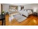 Bright bedroom with large windows overlooking the yard at 4180 S Yukon Way, Lakewood, CO 80235