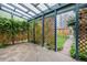 Outdoor patio featuring stone pavers and lattice walls covered with climbing plants at 2514 N Humboldt St, Denver, CO 80205