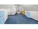 Expansive bonus room featuring carpet, white walls, and great lighting at 2514 N Humboldt St, Denver, CO 80205