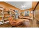 Bright living room with hardwood floors, vintage furniture, and lots of natural light at 2514 N Humboldt St, Denver, CO 80205