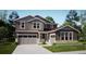 Charming two-story home with a three car garage and professionally landscaped yard at 85 Wooten Ave, Brighton, CO 80601