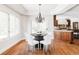 Charming dining area with natural light and easy access to kitchen at 5550 Preserve Dr, Greenwood Village, CO 80121