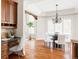Bright dining area adjacent to the kitchen, featuring hardwood floors at 5550 Preserve Dr, Greenwood Village, CO 80121