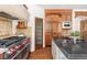 Well-appointed kitchen with large island, stainless steel appliances, and custom cabinetry at 5550 Preserve Dr, Greenwood Village, CO 80121