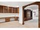 Home office space with custom wood cabinets and shelving at 5550 Preserve Dr, Greenwood Village, CO 80121