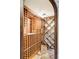 Custom wine cellar with ample storage and unique tile flooring at 5550 Preserve Dr, Greenwood Village, CO 80121