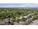 Aerial shot of the property highlighting its location, mature trees, and neighborhood setting at 14186 E Hampden Pl, Aurora, CO 80014