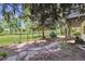 Landscaped backyard with stone pathway, rock features and lush green grass area at 14186 E Hampden Pl, Aurora, CO 80014