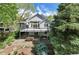 The backyard of the house is beautifully landscaped and has a spacious porch at 14186 E Hampden Pl, Aurora, CO 80014