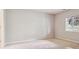 Bedroom features carpeted floors, white walls and large window at 14186 E Hampden Pl, Aurora, CO 80014