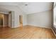 Spacious bedroom with hardwood floors, vaulted ceilings, and natural light at 14186 E Hampden Pl, Aurora, CO 80014