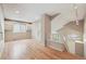 Open living room featuring hardwood floors and natural light at 14186 E Hampden Pl, Aurora, CO 80014