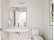 Clean bathroom featuring modern fixtures, a sleek floating sink, and a minimalist aesthetic at 2880 Zuni St # 408, Denver, CO 80211