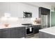 Well-equipped kitchen with stainless steel appliances, modern cabinetry, and ample counter space at 2880 Zuni St # 408, Denver, CO 80211