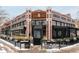 Inviting restaurant with decorative exterior, black awnings, greenery and corner entrance with Señor Bear signage at 2880 Zuni St # 408, Denver, CO 80211