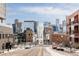 Downtown Denver street view featuring city skyline and bridge in the background at 2880 Zuni St # 408, Denver, CO 80211