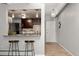 Open kitchen with breakfast bar and modern design at 100 S Clarkson St # 105, Denver, CO 80209