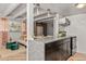 Bright space featuring a breakfast bar, adjacent to a cozy daybed area with plenty of light at 100 S Clarkson St # 105, Denver, CO 80209