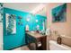 Stylish bathroom boasts a unique glass vessel sink, eye-catching tile work, and contemporary decor at 3647 S Uravan St, Aurora, CO 80013