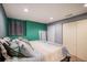 Bedroom with closet, carpet floors, lots of pillows and cozy atmosphere at 3647 S Uravan St, Aurora, CO 80013