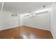 Clean basement with light-colored walls and floors featuring a window for natural light at 6088 Quail Ct, Arvada, CO 80004