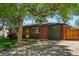 Beautiful brick home with attached garage and well-kept lawn showcases modern curb appeal at 6088 Quail Ct, Arvada, CO 80004