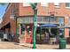 Hunter Bay Coffee Roasters offers an inviting corner shop with a red door and outdoor seating at 6088 Quail Ct, Arvada, CO 80004
