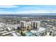 Panoramic aerial of the condo complex showcasing two buildings and surrounding cityscape at 7865 E Mississippi Ave # 1102, Denver, CO 80247