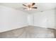 Spacious bedroom featuring neutral carpet and a large closet at 1534 S Ouray Cir # B, Aurora, CO 80017
