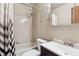 Cozy bathroom with a shower-tub combination, a mirrored vanity, and a neutral color scheme at 10241 Routt St, Broomfield, CO 80021