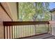 Balcony view overlooking a green space with mature trees, providing a serene outdoor space at 14590 E 2Nd Ave # B309, Aurora, CO 80011
