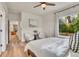 Bright bedroom featuring natural light and neutral tones, offering a peaceful retreat at 1308 Snowberry Ln # 303, Louisville, CO 80027