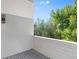 Relaxing outdoor patio features gray plank flooring, wood railing and ample space at 1308 Snowberry Ln # 303, Louisville, CO 80027