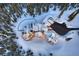 Aerial view of a snow-covered mountain home at 300 Little Sallie Barber Trl, Breckenridge, CO 80424