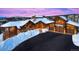 Mountain home with large windows and attached garage at 300 Little Sallie Barber Trl, Breckenridge, CO 80424