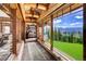 Hallway with large windows showcasing mountain views at 300 Little Sallie Barber Trl, Breckenridge, CO 80424