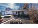 Charming bungalow with a cozy front porch, desert xeriscape and brick walkway at 437 Raleigh St, Denver, CO 80204