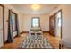Bright living room with hardwood floors, natural light, and a view to the bedroom at 437 Raleigh St, Denver, CO 80204