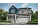 Inviting two-story home with a blend of blue and gray siding, complemented by a covered front porch and attached garage at 39765 Gibson St, Elizabeth, CO 80107