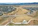 Aerial view of the community with walking paths and green spaces at 9162 Star Streak Cir, Littleton, CO 80125
