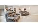 Spacious basement featuring carpet flooring and cozy leather reclining chairs at 9162 Star Streak Cir, Littleton, CO 80125