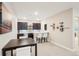 Basement featuring a wet bar with bar seating and a table and chairs at 9162 Star Streak Cir, Littleton, CO 80125