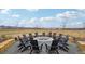Community fire pit surrounded by Adirondack chairs for outdoor gatherings at 9162 Star Streak Cir, Littleton, CO 80125