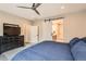 Main bedroom featuring a sliding barn door to ensuite bathroom at 9162 Star Streak Cir, Littleton, CO 80125