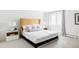 Cozy bedroom with a comfortable bed, neutral decor, and natural light at 3901 S Dexter St, Cherry Hills Village, CO 80113
