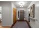 Welcoming foyer with a stylish light fixture, tile flooring, and neutral decor at 3901 S Dexter St, Cherry Hills Village, CO 80113