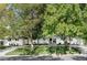 Charming single-story home with manicured lawn and mature trees providing ample shade at 3901 S Dexter St, Cherry Hills Village, CO 80113