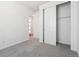 Bedroom with closet and carpet at 8317 Snake River St, Littleton, CO 80125