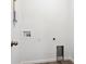 Bright laundry room with hookups for washer and dryer at 8317 Snake River St, Littleton, CO 80125