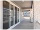 A covered patio with sliding glass doors at 8317 Snake River St, Littleton, CO 80125